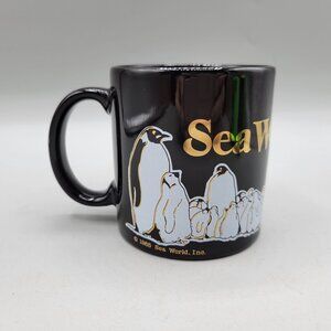 Vintage 1991 Sea World Black Ceramic Mug With Gold Logo Penguin Whale Graphics